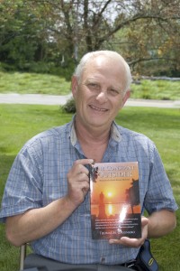 Tom Cirignano holding book
